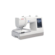 Macchina per cucire e ricamare Janome Memory Craft MC100E vista di profilo con telaio