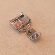 Piedino chiusura lampo