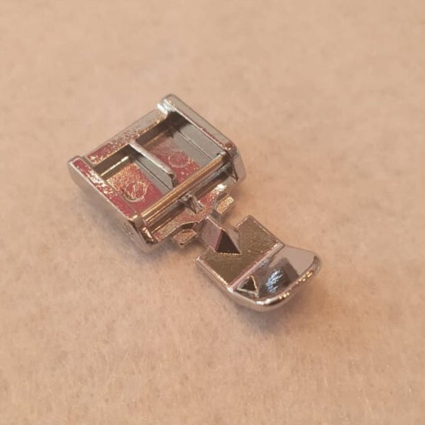 Piedino chiusura lampo